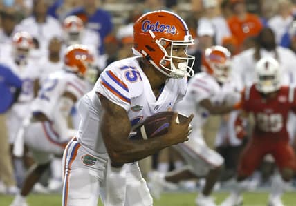 Sep 4, 2021; Gainesville, Florida, USA; Florida Gators quarterback Anthony Richardson (15) runs the ball in for a touchdown during the fourth quarter against the Florida Atlantic Owls at Ben Hill Griffin Stadium. Mandatory Credit: Kim Klement-USA TODAY Sports