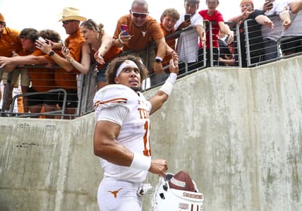 Oct 2, 2021; Fort Worth, Texas, USA; Texas Longhorns quarterback Casey Thompson (11) shakes hands with fans after the game against the TCU Horned Frogs at Amon G. Carter Stadium. Mandatory Credit: Kevin Jairaj-USA TODAY Sports