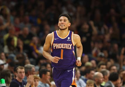 Apr 5, 2022; Phoenix, Arizona, USA; Phoenix Suns guard Devin Booker celebrates in the second half against the Los Angeles Lakers in the second half at Footprint Center. Mandatory Credit: Mark J. Rebilas-USA TODAY Sports