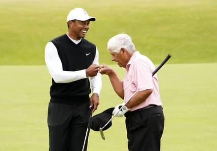 Jul 11, 2022; St. Andrews, SCT; Tiger Woods and Lee Trevino during the R&A Celebration of Champions four-hole challenge at the 150th Open Championship golf tournament at St. Andrews Old Course. Mandatory Credit: Rob Schumacher-USA TODAY Sports