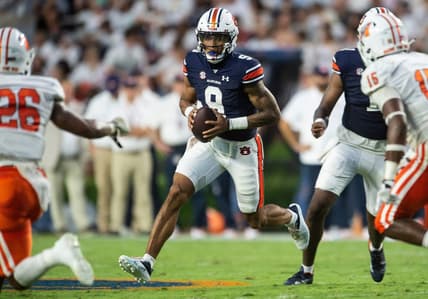 Auburn Tigers quarterback Robby Ashford (9) runs an option play as Auburn Tigers take on Mercer Bears at Jordan-Hare Stadium in Auburn, Ala., on Saturday, Sept. 3, 2022. Auburn Tigers leads Mercer Bears 28-7 at halftime.