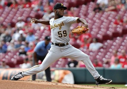 Sep 14, 2022; Cincinnati, Ohio, USA; Pittsburgh Pirates starting pitcher Roansy Contreras (59) throws a pitch against the Cincinnati Reds during the first inning at Great American Ball Park. Mandatory Credit: David Kohl-USA TODAY Sports