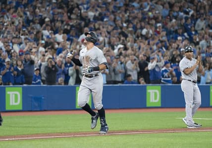 Sep 28, 2022; Toronto, Ontario, CAN; New York Yankees designated hitter Aaron Judge (99) celebratess after hitting his 61st home run scoring two runs against the Toronto Blue Jays during the seventh inning at Rogers Centre. Mandatory Credit: Nick Turchiaro-USA TODAY Sports
