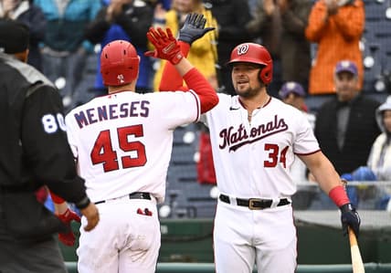Oct 1, 2022; Washington, District of Columbia, USA; Washington Nationals first baseman Joey Meneses (45) is congratulated by designated hitter Luke Voit (34) after hitting home run against the Philadelphia Phillies during the fifth inning at Nationals Park. Mandatory Credit: Brad Mills-USA TODAY Sports