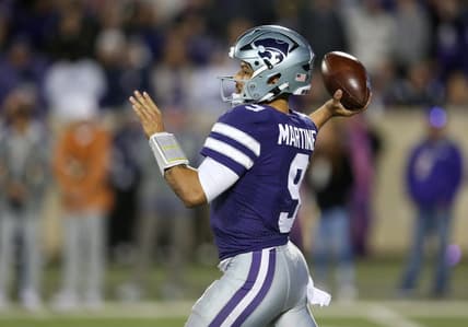 Nov 5, 2022; Manhattan, Kansas, USA; Kansas State Wildcats quarterback Adrian Martinez (9) drops back to pass during the third quarter against the Texas Longhorns at Bill Snyder Family Football Stadium. Mandatory Credit: Scott Sewell-USA TODAY Sports