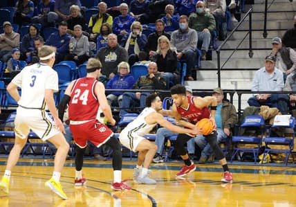 SDSU's Matt Mims defends Denver's Coban Porter during Saturday's Summit League game at Frost Arena.

Img 5787