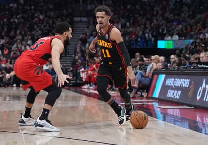 Jan 14, 2023; Toronto, Ontario, CAN; Atlanta Hawks guard Trae Young (11) controls the ball as Toronto Raptors guard Fred VanVleet (23) tries to defend during the first quarter at the Scotiabank Arena against the Toronto Raptors. Mandatory Credit: Nick Turchiaro-USA TODAY Sports