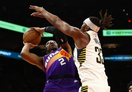 Jan 21, 2023; Phoenix, Arizona, USA; Indiana Pacers center Myles Turner (33) defends against Phoenix Suns forward Josh Okogie (2) in the first half at Footprint Center. Mandatory Credit: Mark J. Rebilas-USA TODAY Sports