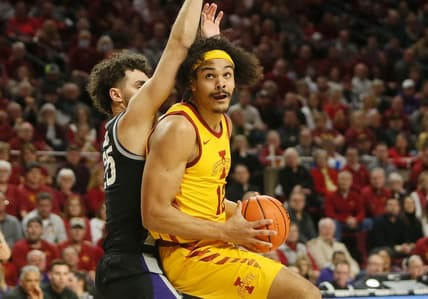 Iowa State University Cyclones forward Robert Jones (12)  looks for a shot around Kansas State Wildcats forward Ismael Massoud (25) during the first half at Hilton Coliseum Tuesday, 2023, in Ames, Iowa.

Kansas State And Iowa State Men S Basketball