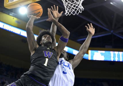 Feb 2, 2023; Los Angeles, California, USA; Washington Huskies forward Keion Brooks (1) scores past UCLA Bruins forward Adem Bona (3) in the second half at Pauley Pavilion presented by Wescom. Mandatory Credit: Jayne Kamin-Oncea-USA TODAY Sports