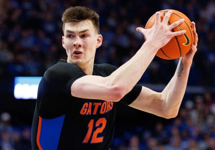 Feb 4, 2023; Lexington, Kentucky, USA; Florida Gators forward Colin Castleton (12) drives to the basket during the first half against the Kentucky Wildcats at Rupp Arena at Central Bank Center. Mandatory Credit: Jordan Prather-USA TODAY Sports