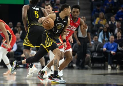 Mar 3, 2023; San Francisco, California, USA; Golden State Warriors guard Jordan Poole (3) drives around New Orleans Pelicans forward Herbert Jones (5) during the first quarter at Chase Center. Mandatory Credit: D. Ross Cameron-USA TODAY Sports