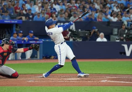 May 12, 2023; Toronto, Ontario, CAN; Toronto Blue Jays right fielder George Springer (4) hits a double scoring a run against the Atlanta Braves during the fifth inning at Rogers Centre. Mandatory Credit: Nick Turchiaro-USA TODAY Sports