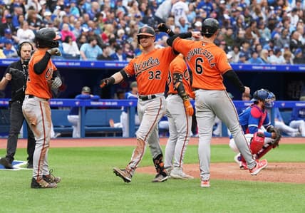 May 20, 2023; Toronto, Ontario, CAN; Baltimore Orioles designated hitter Ryan O'Hearn (32) celebrates after hitting a three-run home run with first baseman Ryan Mountcastle (6) against the Toronto Blue Jays during the eighth inning at Rogers Centre. Mandatory Credit: Nick Turchiaro-USA TODAY Sports