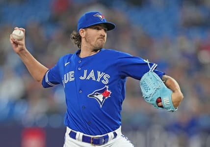 Sep 26, 2023; Toronto, Ontario, CAN; Toronto Blue Jays starting pitcher Kevin Gausman (34) throws a pitch against the New York Yankees during the first inning at Rogers Centre. Mandatory Credit: Nick Turchiaro-USA TODAY Sports