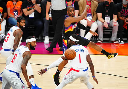 Jun 28, 2021; Phoenix, Arizona, USA; Phoenix Suns guard Chris Paul passes the ball against the Los Angeles Clippers in the first half during game five of the Western Conference Finals for the 2021 NBA Playoffs at Phoenix Suns Arena. Mandatory Credit: Mark J. Rebilas-USA TODAY Sports