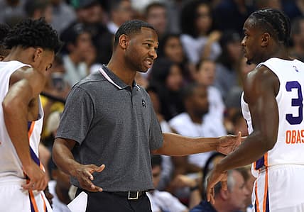 Jul 7, 2019; Las Vegas, NV, USA; Phoenix Suns Summer League head coach Willie Green talks with guard Retin Obasohan (30) during the second half of an NBA Summer League game against the New York Knicks at Thomas & Mack Center. Mandatory Credit: Stephen R. Sylvanie-USA TODAY Sports