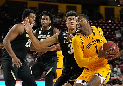 Jan 15, 2022; Tempe, Arizona, USA; Colorado Buffaloes guard Nique Clifford (32) guards Arizona State Sun Devils guard Luther Muhammad (1) during the second half at Desert Financial Arena. Mandatory Credit: Joe Camporeale-USA TODAY Sports