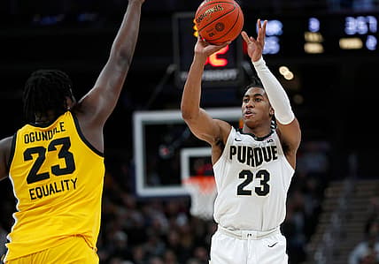 Iowa Hawkeyes forward Josh Ogundele (23) jumps up as Purdue Boilermakers guard Jaden Ivey (23) shoots during the second half of the Big Ten championship title game Sunday, March 13, 2022, at Gainbridge Fieldhouse in Indianapolis. Iowa won, 75-66.

Iowa Hawkeyes Versus Purdue Boilermakers In Big Ten Men S Championship Title Game On Sunday March 13 2022 At Gainbridge Fieldhouse In Indianapolis