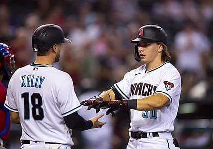 Aug 30, 2022; Phoenix, Arizona, USA; Arizona Diamondbacks outfielder Jake McCarthy (right) celebrates with teammate Carson Kelly after hitting a three run home run in the fourth inning against the Philadelphia Phillies at Chase Field. Mandatory Credit: Mark J. Rebilas-USA TODAY Sports