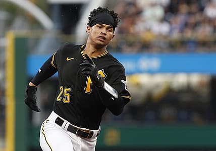 Aug 1, 2023; Pittsburgh, Pennsylvania, USA;  Pittsburgh Pirates catcher Endy Rodriguez (25) runs to third base with an RBI triple against the Detroit Tigers during the second inning at PNC Park. Mandatory Credit: Charles LeClaire-USA TODAY Sports