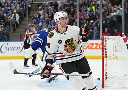 Oct 16, 2023; Toronto, Ontario, CAN; Chicago Blackhawks right wing Corey Perry (94) points  to the crowd after scoring a goal against the Toronto Maple Leafs during the second period at Scotiabank Arena. Mandatory Credit: Nick Turchiaro-USA TODAY Sports
