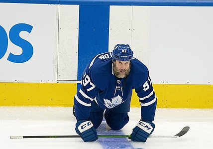 Jan 18, 2021; Toronto, Ontario, CAN; Toronto Maple Leafs center Joe Thornton (97) stretches during the warm-up against the Winnipeg Jets at Scotiabank Arena. Mandatory Credit: Nick Turchiaro-USA TODAY Sports