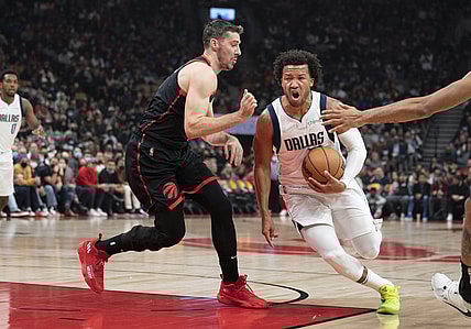Oct 23, 2021; Toronto, Ontario, CAN; Dallas Mavericks guard Jalen Brunson (13) drives to the basket against Toronto Raptors guard Goran Dragic (1) during the first quarter at Scotiabank Arena. Mandatory Credit: Nick Turchiaro-USA TODAY Sports