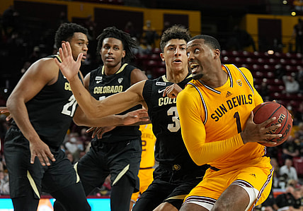 Jan 15, 2022; Tempe, Arizona, USA; Colorado Buffaloes guard Nique Clifford (32) guards Arizona State Sun Devils guard Luther Muhammad (1) during the second half at Desert Financial Arena. Mandatory Credit: Joe Camporeale-USA TODAY Sports