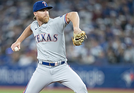 Apr 8, 2022; Toronto, Ontario, CAN; Texas Rangers starting pitcher Jon Gray (22) throws a pitch during the first inning against the Toronto Blue Jays at Rogers Centre . Mandatory Credit: Nick Turchiaro-USA TODAY Sports