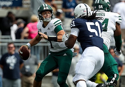 Sep 10, 2022; University Park, Pennsylvania, USA; Ohio Bobcats quarterback Kurtis Rourke (7) is pressured by Penn State Nittany Lions defensive tackle Hakeem Beamon (51) during the first quarter at Beaver Stadium. Mandatory Credit: Matthew OHaren-USA TODAY Sports