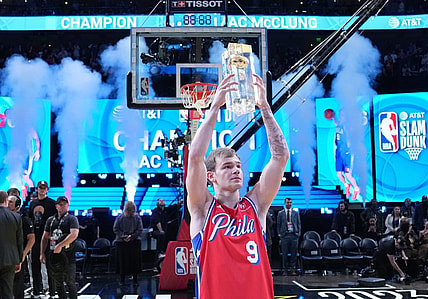 Feb 18, 2023; Salt Lake City, UT, USA; Philadelphia 76ers guard Mac McClung (9) celebrates with the trophy after winning the Dunk Contest during the 2023 All Star Saturday Night at Vivint Arena. Mandatory Credit: Kyle Terada-USA TODAY Sports