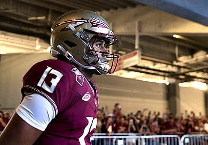 Sep 3, 2023; Orlando, Florida, USA; Florida State Seminoles quarterback Jordan Travis (13) takes the field before the game against the LSU Tigers at Camping World Stadium. Mandatory Credit: Melina Myers-USA TODAY Sports