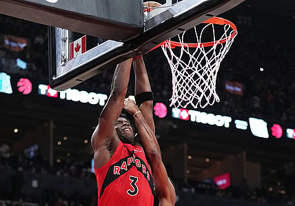 Nov 19, 2023; Toronto, Ontario, CAN; Toronto Raptors forward O.G. Anunoby (3) drives to the basket as Detroit Pistons guard Alec Burks (14) try to block during the second quarter at Scotiabank Arena. Mandatory Credit: Nick Turchiaro-USA TODAY Sports