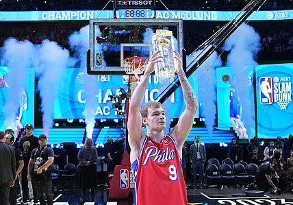 Feb 18, 2023; Salt Lake City, UT, USA; Philadelphia 76ers guard Mac McClung (9) celebrates with the trophy after winning the Dunk Contest during the 2023 All Star Saturday Night at Vivint Arena. Mandatory Credit: Kyle Terada-USA TODAY Sports