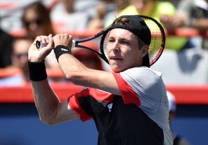 Aug 4, 2019; Montreal, Quebec, Canada; Ilya Ivashka of Belarus plays a shot against Yoshihito Nishioka of Japan (not pictured) during the Rogers Cup tennis tournament at Stade IGA. Mandatory Credit: Eric Bolte-USA TODAY Sports