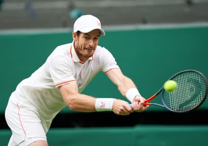 Jun 28, 2021; London, United Kingdom; Andy Murray (GBR) during his match against Nikoloz Basilashvili (GE) on the Centre Court in the first round at All England Lawn Tennis and Croquet Club. Mandatory Credit: Peter van den Berg-USA TODAY Sports