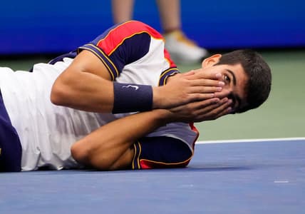 Sep 3, 2021; Flushing, NY, USA; Carlos Alcaraz of Spain reacts after beating Stefanos Tsitsipas of Greece (not pictured) on day five of the 2021 U.S. Open tennis tournament at USTA Billie King National Tennis Center. Mandatory Credit: Robert Deutsch-USA TODAY Sports