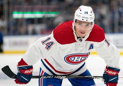 Sep 25, 2021; Toronto, Ontario, CAN; Montreal Canadiens center Nick Suzuki (14) gets ready for the face-off during the first period against the Toronto Maple Leafs at Scotiabank Arena. Mandatory Credit: Nick Turchiaro-USA TODAY Sports