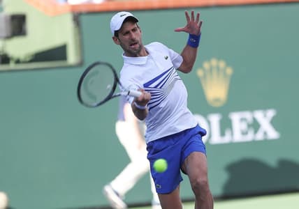 Novak Djokovic and Fabio Fognini play doubles against Lukasz Kubot and Marcelo Melo during the doubles semifinal match at the BNP Paribas Open in Indian Wells, March 15, 2019. 

Bnp Paribas Open March 15 7