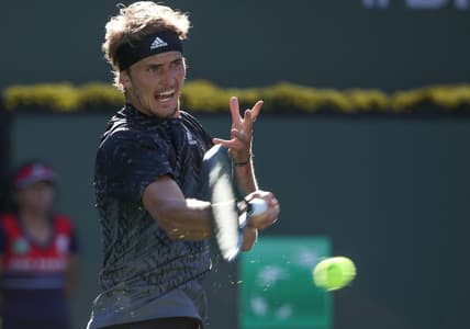 Alexander Zverev hits a shot against Taylor Fritz during their quarterfinal match at the BNP Paribas Open in Indian Wells, October 15, 2021.

Bnp Friday 16