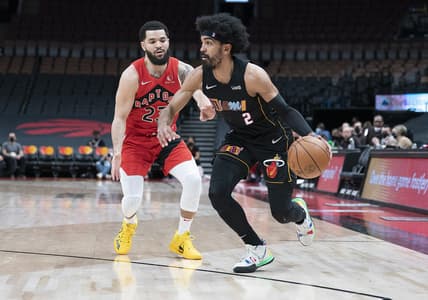 Feb 1, 2022; Toronto, Ontario, CAN; Miami Heat guard Gabe Vincent (2) controls the ball as Toronto Raptors guard Fred VanVleet (23) tries to defend during the first quarter at Scotiabank Arena. Mandatory Credit: Nick Turchiaro-USA TODAY Sports
