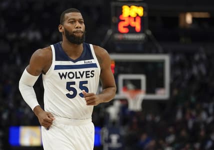 Dec 27, 2021; Minneapolis, Minnesota, USA; Minnesota Timberwolves center Greg Monroe (55) looks on against the Boston Celtics during the third quarter at Target Center. Mandatory Credit: Nick Wosika-USA TODAY Sports
