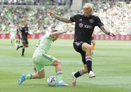 Mar 6, 2022; Austin, Texas, USA; Austin FC midfielder Alexander Ring (8) battles for the ball with Inter Miami midfielder Brek Shea (20) in the first half of a MLS game at Q2 Stadium. Mandatory Credit: Erich Schlegel-USA TODAY Sports