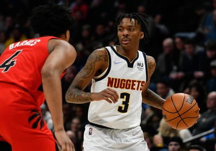Mar 12, 2022; Denver, Colorado, USA; Toronto Raptors forward Scottie Barnes (4) and Denver Nuggets guard Bones Hyland (3) during the first quarter at Ball Arena. Mandatory Credit: John Leyba-USA TODAY Sports