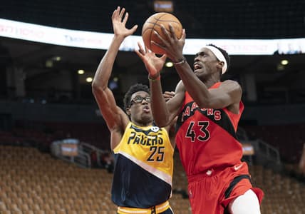 Mar 26, 2022; Toronto, Ontario, CAN; Toronto Raptors forward Pascal Siakam (43) drives to the basket against Indiana Pacers forward Jalen Smith (25) during the third quarter at Scotiabank Arena. Mandatory Credit: Nick Turchiaro-USA TODAY Sports