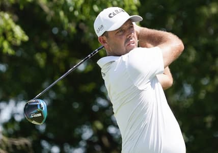 May 15, 2022; McKinney, Texas, USA; Charl Schwartzel plays his shot from the second tee during the final round of the AT&T Byron Nelson golf tournament. Mandatory Credit: Raymond Carlin III-USA TODAY Sports