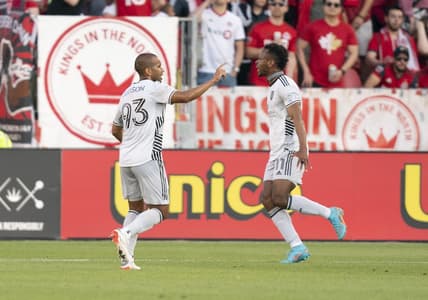 Jul 9, 2022; Toronto, Ontario, CAN; San Jose Earthquakes forward Jeremy Ebobisse (11) scores a goal and celebrates with San Jose Earthquakes midfielder Judson (93) against Toronto FC during the first half at BMO Field. Mandatory Credit: Nick Turchiaro-USA TODAY Sports