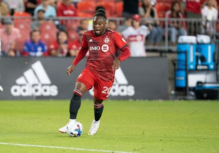 Jul 9, 2022; Toronto, Ontario, CAN; Toronto FC forward Ayo Akinola (20) controls the ball against the San Jose Earthquakes during the second half at BMO Field. Mandatory Credit: Nick Turchiaro-USA TODAY Sports