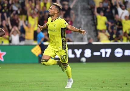 Jul 13, 2022; Nashville, Tennessee, USA; Nashville SC midfielder Hany Mukhtar (10) celebrates after a goal during the first half against the Seattle Sounders at GEODIS Park. Mandatory Credit: Christopher Hanewinckel-USA TODAY Sports